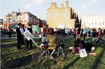  ?? File/reuters ?? People gather in Windrush Square to show solidarity with the Windrush generation in the Brixton district of London on Friday.