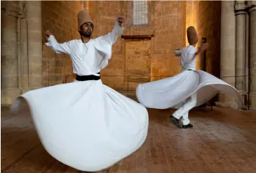  ?? ?? WHIRLING DERVISH ceremonies originated in the 13th century; some practition­ers can spin for an hour without getting vertigo.