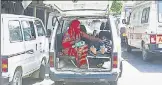  ?? DHEERAJ DHAWAN/HT ?? A woman waits in an ambulance with her kin, a patient, while paper work is being completed by other relatives so that her kin’s screening for Covid-19 is done and then treatment by doctors is started, in Lucknow.