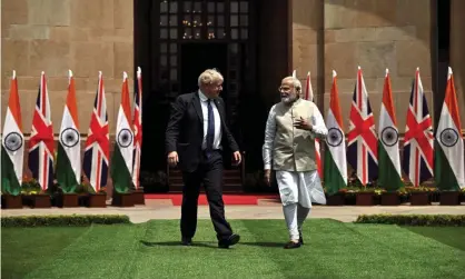  ?? Photograph: Ben Stansall/Reuters ?? Boris Johnson with Narendra Modi: the UK prime minister ‘thought he was leaving his troubles behind in Westminste­r’.