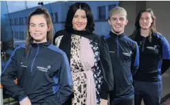  ??  ?? Power boost: Power NI’s Gemma Louise Bond with bursary recipients (l-r) Lauren Roy, Callum Nash and Afton Fitzhenry