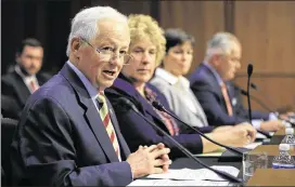  ?? MANUEL BALCE CENETA / AP ?? Washington state Insurance Commission­er Mike Kreidler and Alaska Division of Insurance Director Lori Wing-Heier join other officials testifying Wednesday during a Senate Health, Education, Labor & Pensions Committee hearing.