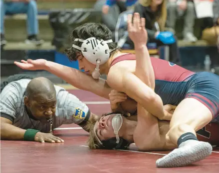  ?? RICK KINTZEL/THE MORNING CALL ?? Liberty’s Kam Abboud, top, shown here wrestling St. Joe’s Prep’s Keegan Swift in March at the Northeast Regional tournament, picked up a key win against Freedom on Wednesday night.