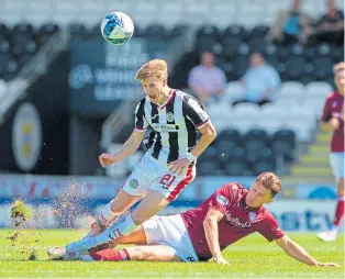  ?? ?? St Mirren’s Alex Grieve battles it out with Arbroath’s Michael Mckenna