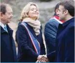  ?? — AFP ?? SAINT-DENIS: Ile-de-France’s Regional Council President Valerie Pecresse (2nd L) shakes hands with France’s President Emmanuel Macron (R) during the inaugurati­on of the Paris 2024 Olympic village in Saint-Denis, northern Paris, on February 29, 2024.