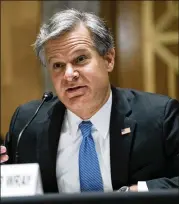  ?? GREG NASH/POOL VIA ASSOCIATED PRESS ?? FBI Director Christophe­r Wray on Tuesday testifies before a Senate Homeland Security and Government­al Affairs Committee hearing on Capitol Hill to discuss security threats 20 years after the September 11 terrorist attacks.