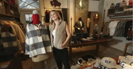  ?? RICHARD LAUTENS PHOTOS/TORONTO STAR ?? Founder/designer of Tuck Shop Trading Co. Lyndsay Borschke is seen in her Yonge and Summerhill shop, filled with quality casual wear.