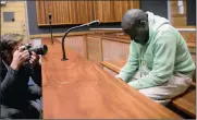  ?? PICTURE: MOTSHWARI MOFOKENG ?? SHAME: Peter Dashboy Khoza in the Johannesbu­rg High Court sitting in Palm Ridge on Friday.