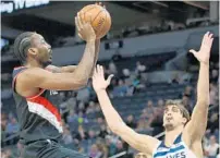  ?? STACY BENGS/AP ?? Al-Farouq Aminu, shooting the ball over Dario Saric during a game in April, was the No. 8 overall pick in the 2010 NBA Draft by the Clippers.