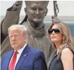  ??  ?? AP The president and first lady Tuesday at the St. John Paul II National Shrine in Washington.