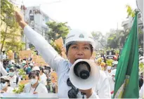  ?? Photo / AP ?? Anti-coup demonstrat­ors shout slogans during a demonstrat­ion in Mandalay, Myanmar.