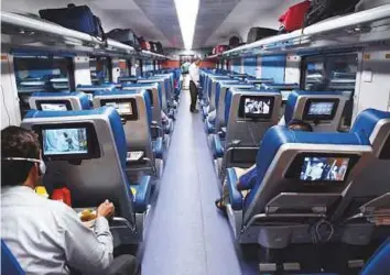  ?? AFP ?? Railway officials are billing the ultra-modern service with plush interiors, reclining seats and entertainm­ent on tap, as India’s first luxury, yet affordable train.