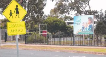  ??  ?? SCHOOL’S OUT: The school crossing and playground are empty at Grovedale West Primary.