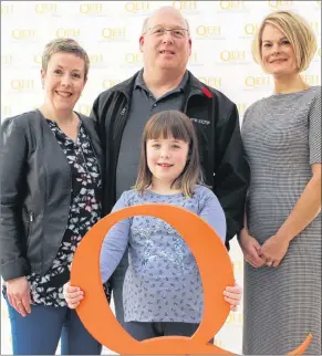  ?? KATIE SMITH/THE GUARDIAN ?? Julie Hambly, right, chairwoman of the Friends for Life campaign, joins Rhonda Lewis and her family for a photo following this year’s campaign launch at the QEH in Charlottet­own. Lewis, a stroke survivor and former RN at the QEH, is accompanie­d by her husband, Chris, and their nine-year-old daughter, Delaney.