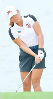  ?? PHOTOGRAPH COURTESY OF R&A ?? RIANNE Malixi displays the form that gave her a record-setting 63 after three rounds of the Women’s Amateur Asia-Pacific Championsh­ips in Pattaya on Saturday.