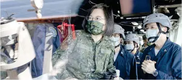  ?? Associated Press ?? Tsai Ing-wen is seen onboard a navy ship during an inspection of Han Kuang exercises in Taiwan on Tuesday.