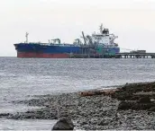  ?? Elaine Thompson / Associated Press ?? A tanker is moored at a BP oil refinery in Washington. The British oil and gas company has contribute­d millions to a campaign against the state’s Initiative 1631.