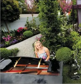  ?? Photo: Gerry Mooney ?? Jodie Moran from Kildare playing the piano in the ‘Composers Garden’ in the show garden area of Bloom 2017.