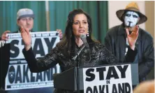  ??  ?? Oakland Raiders fans begin a march on 66th Avenue past the Coliseum after the city’s mayor provided details of a last-minute stadium plan offered to team officials and the NFL. Oakland Mayor Libby Schaaf shares details of a counteroff­er to persuade NFL owners not to move the Raiders to Las Vegas.