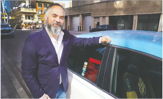  ?? DEAN PILLING ?? Well-travelled Alberta writer Marcello Di Cintio spent months interviewi­ng and profiling taxi drivers for his new book, Driven: The Secret Lives of Taxi Drivers.