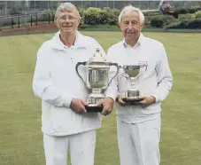  ??  ?? Champion of Champions winners Rob Craggs, left and Eddie Middlemass.