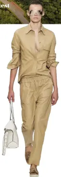  ??  ?? Tod’s Shirt and Pants
The Italian brand puts a luxe spin on utilitaria­n flair in this twopiece, neutral-toned ensemble in butter-soft leather. Price on request