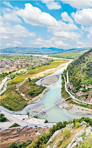  ?? ?? Ksamil, on Albania’s south coast, has clear waters and beaches to rival traditiona­l Mediterran­ean favourites iThe 18th-century houses and mosques of Berat’s old town perch on the hillside above the River Osum