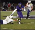  ?? OWEN MCCUE - MEDIANEWS GROUP ?? Phoenixvil­le’s Ahmid Spivey (6) avoids a tackle after a catch Nov. 5 against Upper Merion.