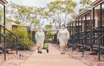  ?? Picture: Glenn Campbell ?? IN QUARANTINE: Staff conduct a swabbing run at the Howard Springs coronaviru­s quarantine centre on Darwin’s outskirts.