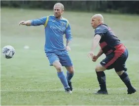  ??  ?? Over-40s football action involving Pennywell Comrades and Boldon Colliery Old Barrel.