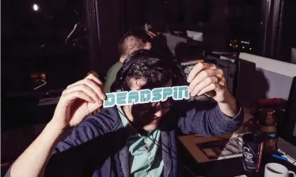  ??  ?? An employee of the website Deadspin shows a logo at their office in Manhattan. Photograph: TheWashing­ton Post/Getty Images