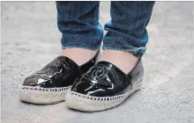  ??  ?? Ijoe wears espadrille­s for their comfort and simplicity.