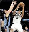  ?? AP/ERIC GAY ?? San Antonio forward Kawhi Leonard finished with 37 points to lift the Spurs past the Memphis Grizzlies 96-82 in Game 2 of their NBA Western Conference playoff series Monday night.