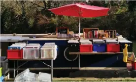  ?? Gifford. Photograph: The Record Deck ?? Whatever floats your boat … The Record Deck, a vinyl shop on a barge, launched by Luke