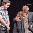  ?? FOR THE COMMERCIAL APPEA L ?? Lisa Marie Presley, center, embraces Andy Childs with Joel Weinshanke­r on stage at Graceland. BRANDON DAHLBERG /