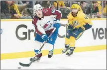  ?? ?? Colorado Avalanche right wing Nicolas Aube-Kubel (16) moves the puck ahead of Nashville Predators’ Alexandre Carrier (45) during the first period in Game 4 of an NHL hockey first-round playoff series in Nashville, Tenn. (AP)