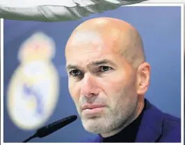  ??  ?? Zinedine Zidane attends a press conference to announce his resignatio­n as Real Madrid manager and, below, Gareth Bale scoring with a spectacula­r bicycle kick during the UEFA Champions League final between Real Madrid and Liverpool