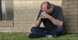  ?? MARK ROGERS- THE ASSOCIATED PRESS ?? A man prays outside of the Medical Center Hospital Emergency room in Odessa, Texas, Saturday.