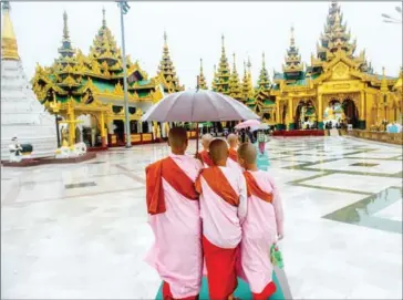  ?? JUSTIN MOTT/THE NEW YORK TIMES ?? The Shwedagon Pagoda in Yangon, on July 24, 2012. Sectarian tension is a fact of life in Myanmar, a majorityBu­ddhist country, but interfaith conflict has escalated sharply since 2012.