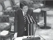  ?? KAZUHIRO NOGI / AGENCE FRANCE-PRESSE ?? Japan’s Prime Minister Shinzo Abe answers questions during a budget committee session of the upper house in Tokyo last week.