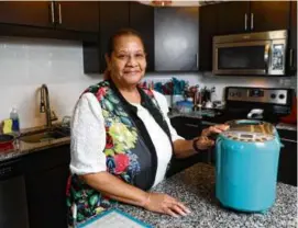  ?? OCTAVIO JONES/NEW YORK TIMES ?? Donna Thomas uses a bread maker to help her make brioche in Riverview, Fla.