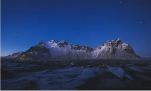  ?? ?? Below: A scene over Mount Vestrahorn, Iceland, shot during nautical twilight.