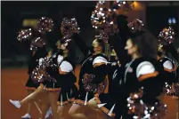  ?? ANDA CHU — BAY AREA NEWS GROUP FILE ?? San Mateo High School cheerleade­rs cheer during a season-opening high school football game against Capuchino in San Mateo on Friday, March 12.