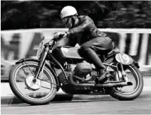  ??  ?? Left: Jock West in action on a 1937 BMW 500 Type 255 Kompressor during the 1937 IOM TT