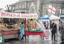  ?? GETTY IMAGES ?? Returning to normal . . . A market in the city centre of Salisbury, England, where economic activity is just starting to pick up again after the Skripal poisoning case.