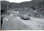  ?? PHOTO COURTESY OF ACADEMIA HISTORICA ?? BELOW: The inaugurati­on motorcade for the McArthur Thruway exits the Jhongsing Tunnel on May 2, 1964.