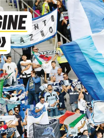  ?? LAPRESSE ?? Tifosi della Lazio durante il match con l’Atalanta. A sinistra, Nicolò D’Angelo