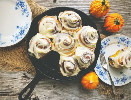  ?? RENEE KOHLMAN ?? Mixing up a batch of pumpkin cinnamon buns with cream cheese icing will fill the kitchen with the scents of fall.
