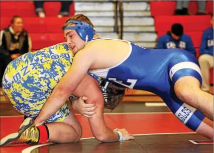  ?? ROD JAMES - FOR DIGITAL FIRST MEDIA ?? Exeter’s Dennis Karas, right, works against Tulpehocke­n’s Zach Ruffner during the 220-pound final of the BCIAA Individual Wrestling Tournament on Jan. 13.