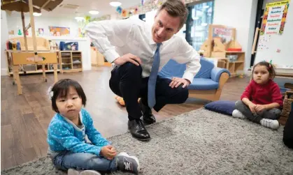  ?? Photograph: WPA/Getty Images ?? Jeremy Hunt at Busy Bees nursery, south London, after delivering his budget on 15 March.